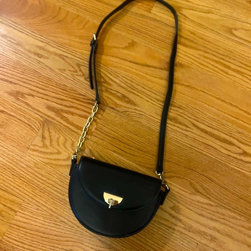 Black crossbody half moon bag with chain